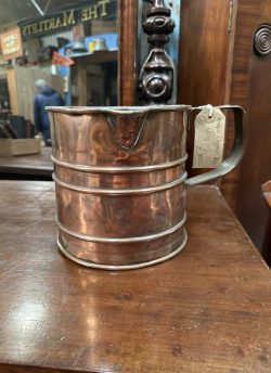 Antique copper ale jug
