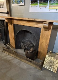 Cast iron fire and wood surround