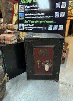 Old, large, heavy, red and black safe